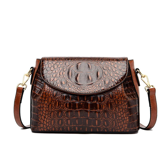 Sac Porté Épaule Vintage avec Design Raffiné, de couleur marron et sur fond blanc.
