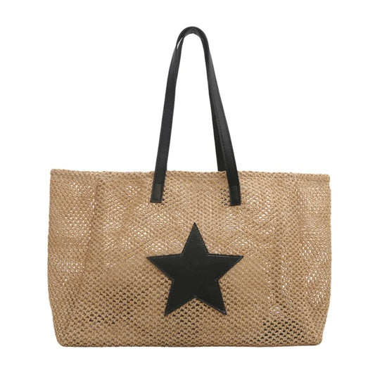 Grand Sac à Main en Raphia Indémodable, de couleur beige et noir et sur fond blanc.