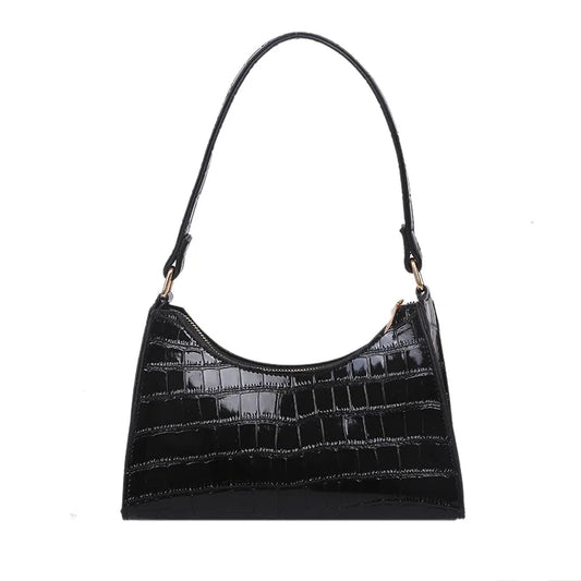 Sac à Main Baguette Rétro en Simili, de couleur noire, avec un design en forme d'écailles. Sur un fond blanc.