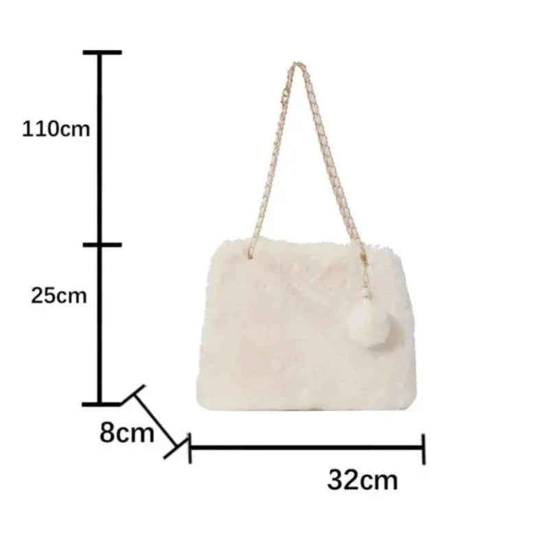 Sac à Main en Fausse Fourrure avec Pompon sur fond blanc