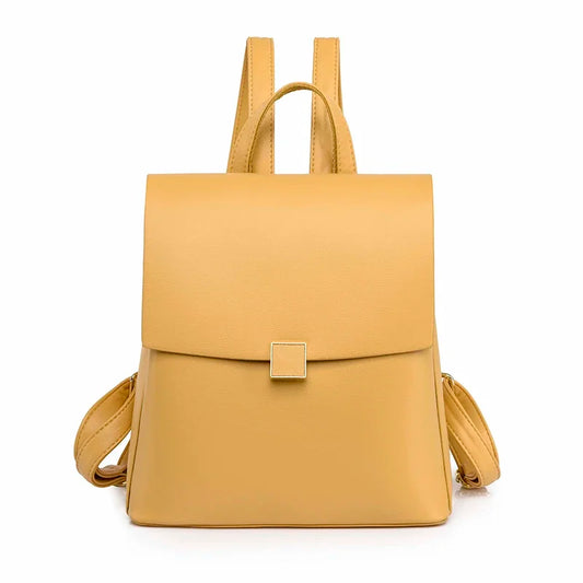 Sac à Dos Cartable Raffiné et Minimaliste, de couleur jaune et sur fond blanc.