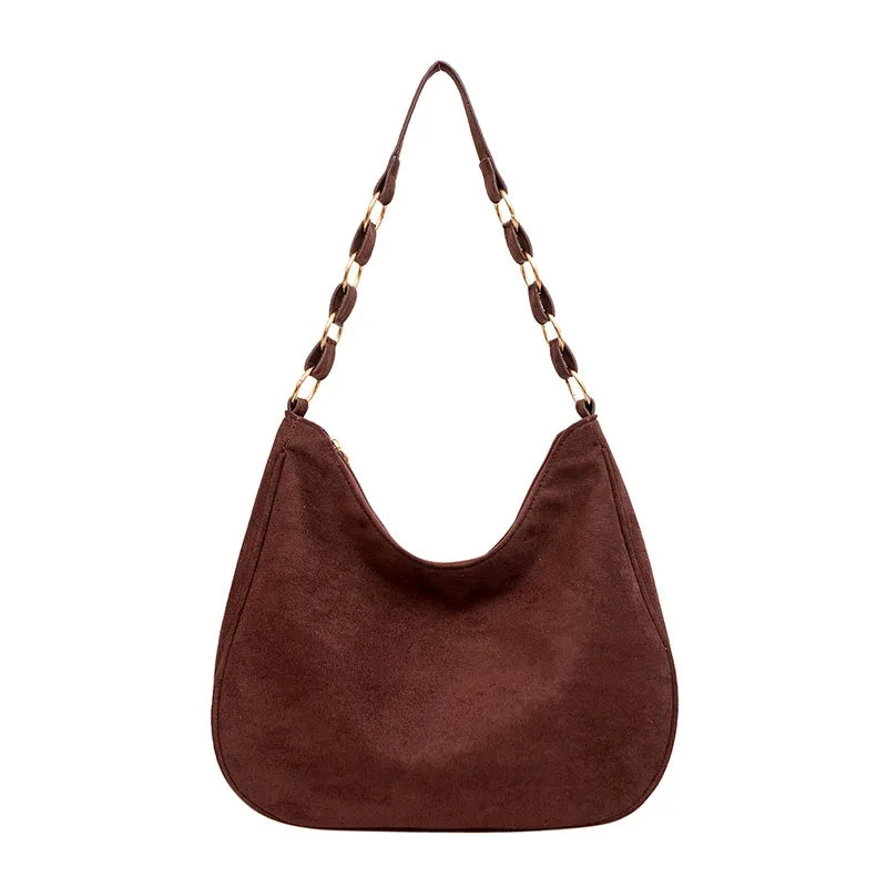 Sac Bandoulière Élégant pour Femme en Simili, de couleur bordeaux et sur fond blanc.