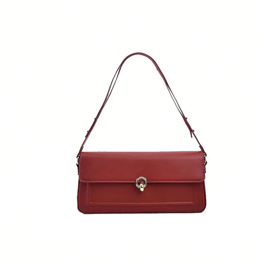 Sac à Main Baguette Style Rétro Chic, de couleur rouge et sur fond blanc.