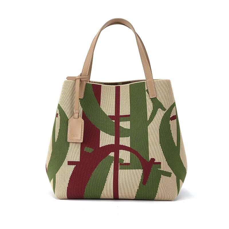 Grand Sac à Main Design Rétro, de couleur beige et sur fond blanc.