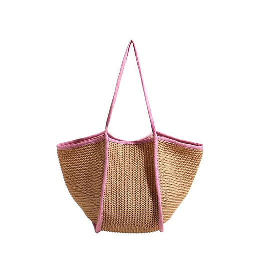 Grand Sac de Plage Pratique et Élégant, de couleur rose et sur fond blanc.
