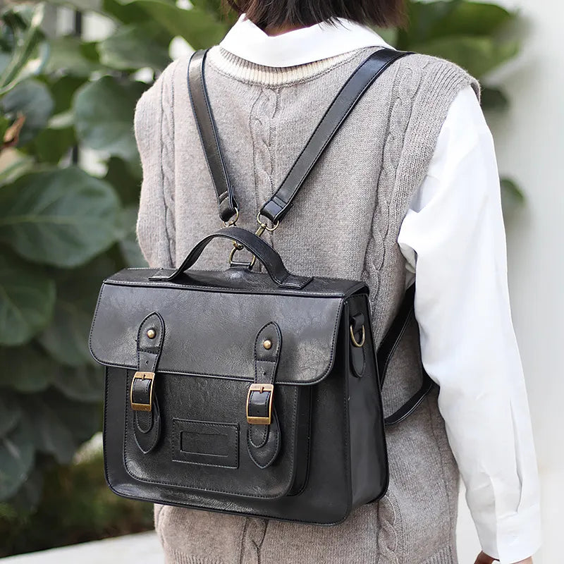 Sac à Dos Cartable Vintage noir porté au dos, cuir à boucles dorées - Marron - Noir