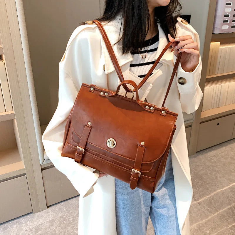 Sac à Main Cartable en cuir marron cognac porté à l'épaule, format structuré avec boucles et fermoir doré - Camel - Blanc - Noir - Marron Foncé