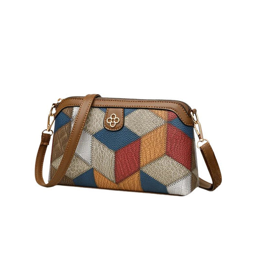 Sac à Main Motif Géométrique avec Bandoulière Ajustable, de couleur bleu et sur fond blanc.