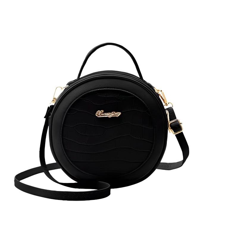 Sac à Main Rond Chic et Élégant, de couleur noire et sur fond blanc.