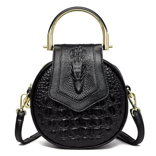 Sac à Main Rond en Cuir Effet Croco sur fond blanc