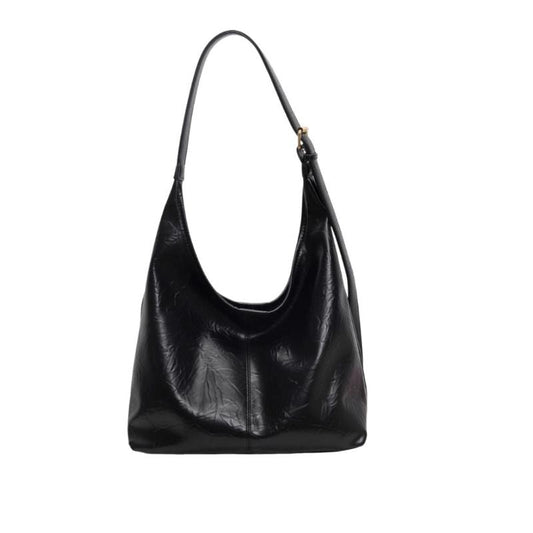 Sac à Main Souple et Tendance à Bandoulière sur fond blanc
