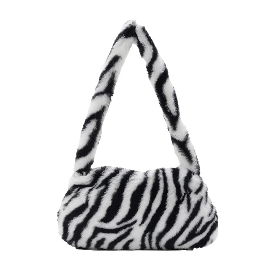 Sac à Main en Fausse Fourrure avec Motif Zébré sur fond blanc