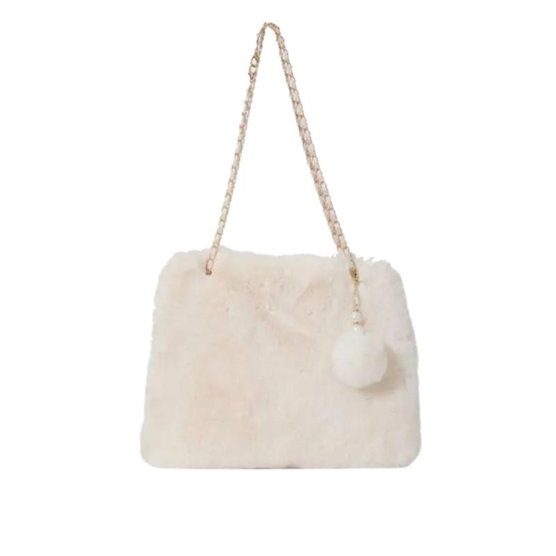Sac à Main en Fausse Fourrure avec Pompon sur fond blanc